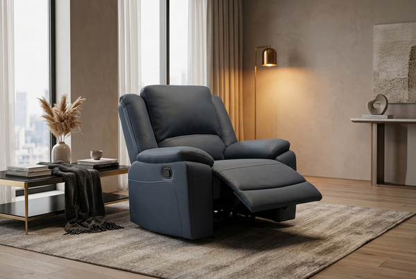 A gray upholstered manual recliner chair with a manual reclining mechanism, featuring a plush cushion and ergonomic design.