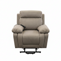 A beige upholstered recliner chair with padded armrests and a black metal base, shown against a plain white background.