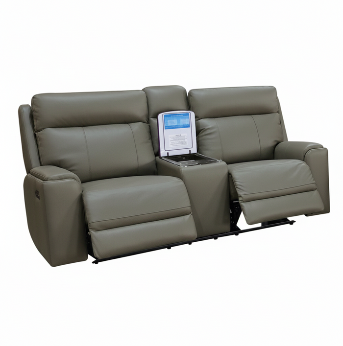 A gray leather reclining double theater sofa with a center console tray holding a portable media player, shown on a plain white background.